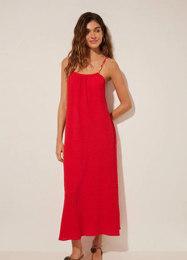 Vestido maxi con textura en rojo de Women'secret.