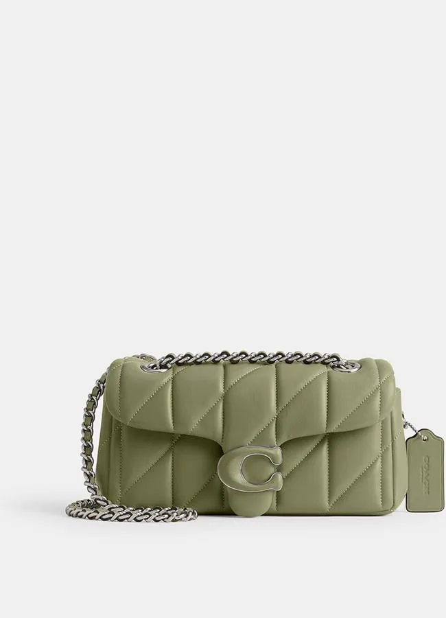 Bolso verde de Coach.