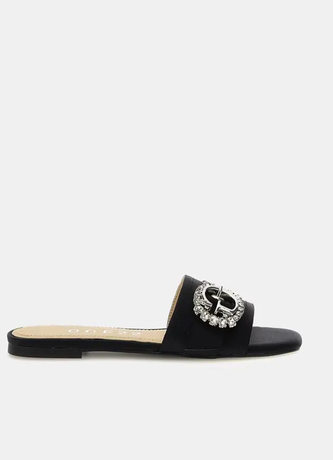 Sandalia negra tipo pala de Guess.