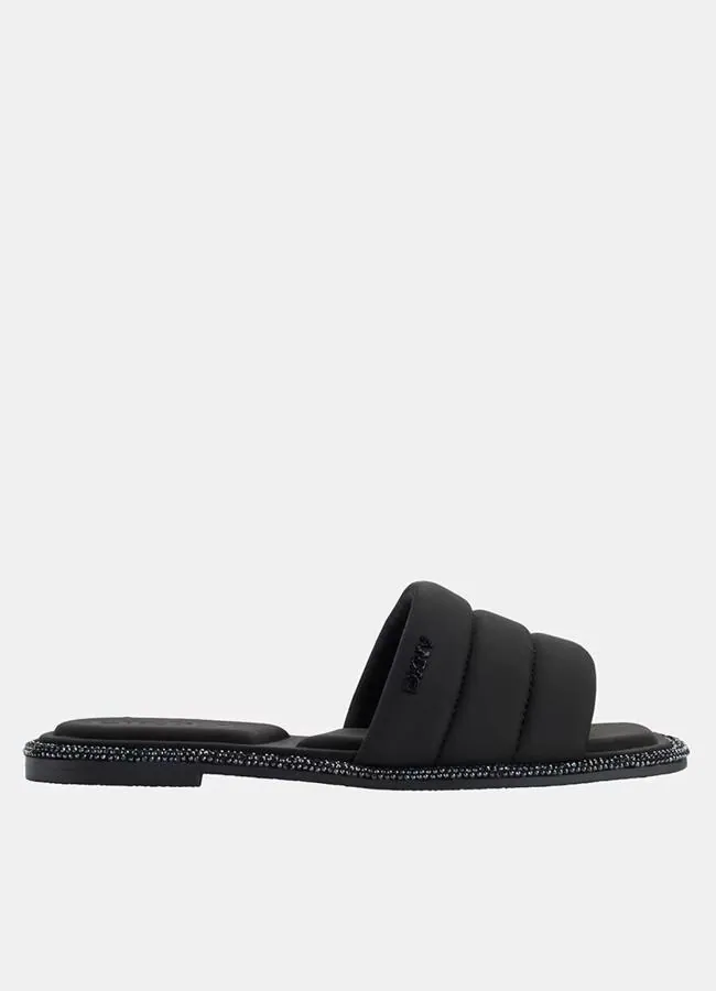 Sandalia negra tipo pala de DKNY.