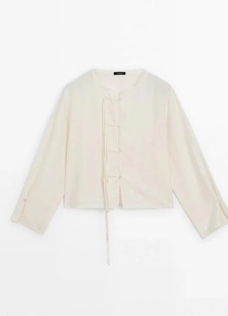 Camisa blanca de Massimo Dutti (59,99 euros)