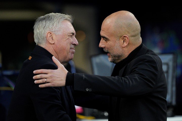 Ancelotti con Guardiola. 