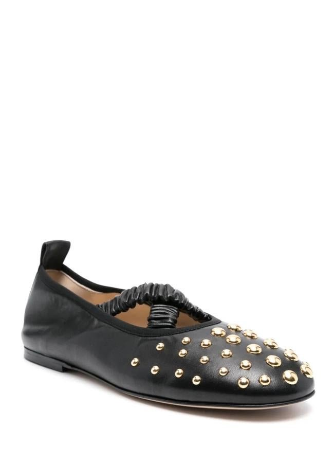 Babuchas con tachuelas de Wandler, 413 euros.