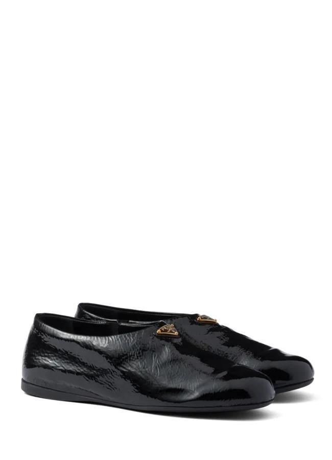Babuchas negras de Prada, 890 euros.