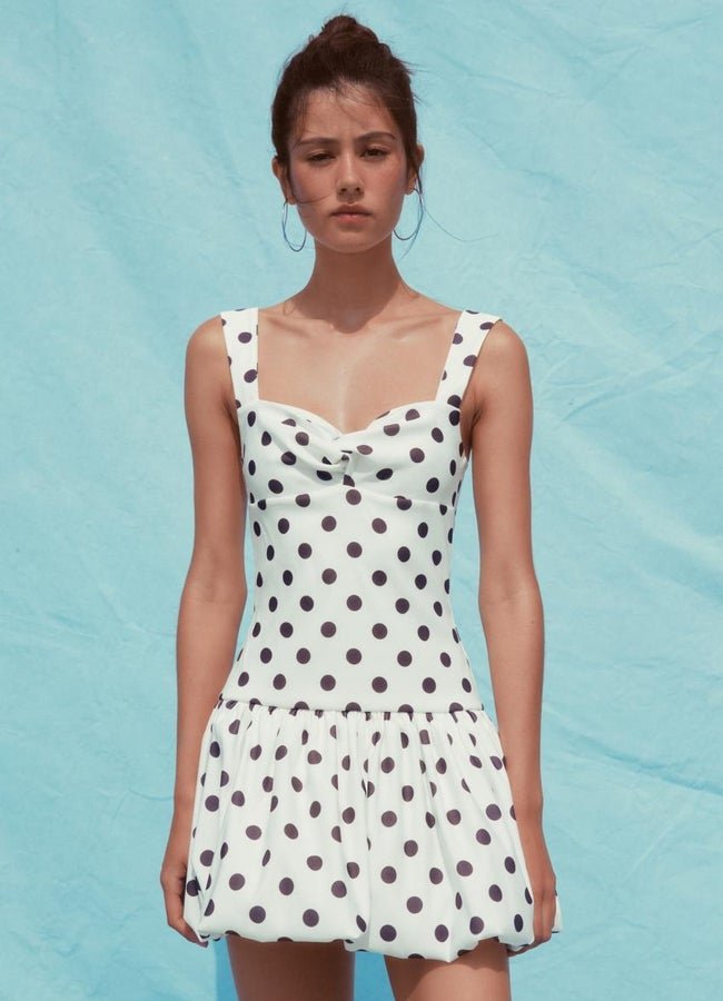 Vestido corto de lunares de Zara.