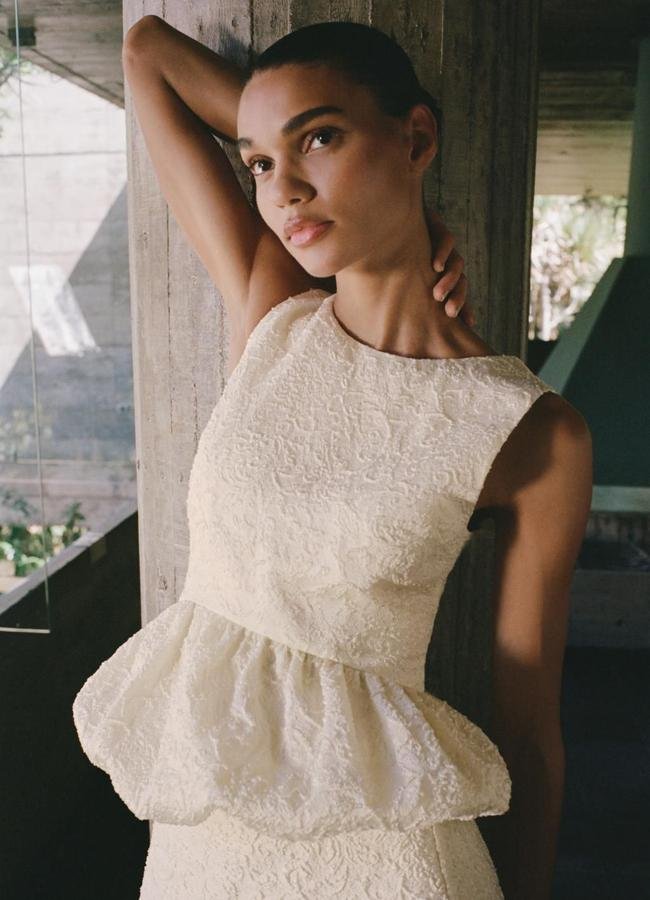 Top peplum con textura