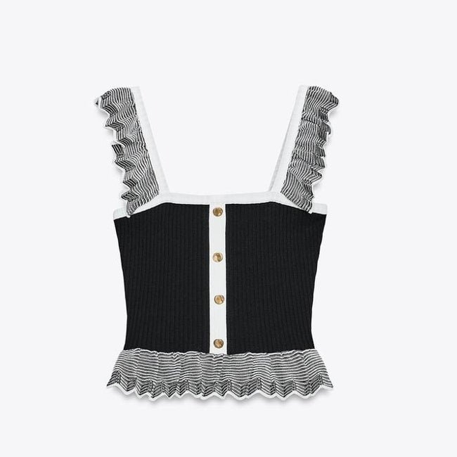 Top con volantes de Zara (22,99 euros)