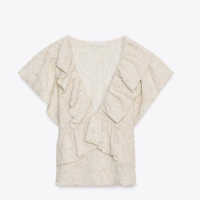 Top con volantes de Zara (19,99 euros)