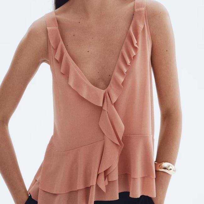 Top con volantes de H&M (17,99 euros)