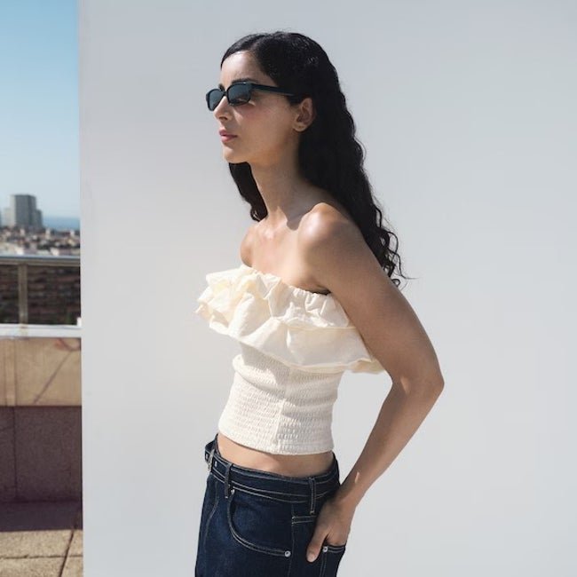 Top con volantes de Mango (25,99 euros)