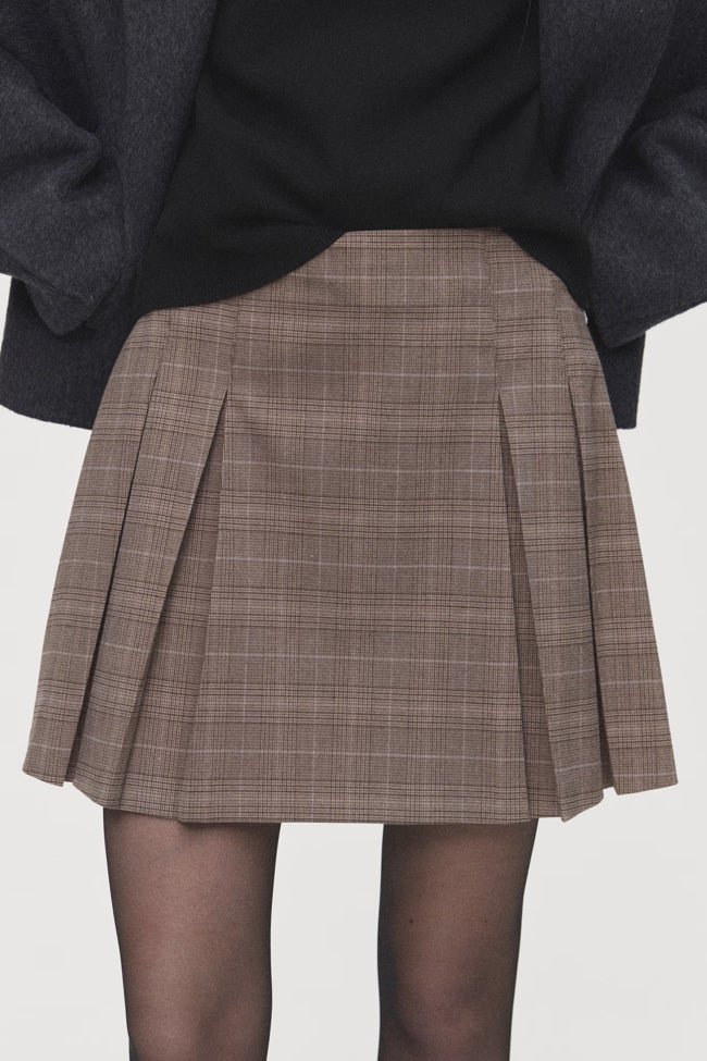 Falda estampada con cuadros de Mango (27,99 euros)