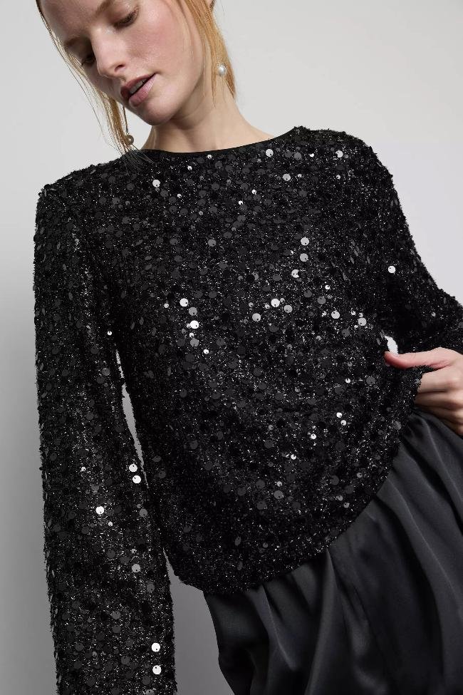 Top con lentejuelas de Primark (18 euros)