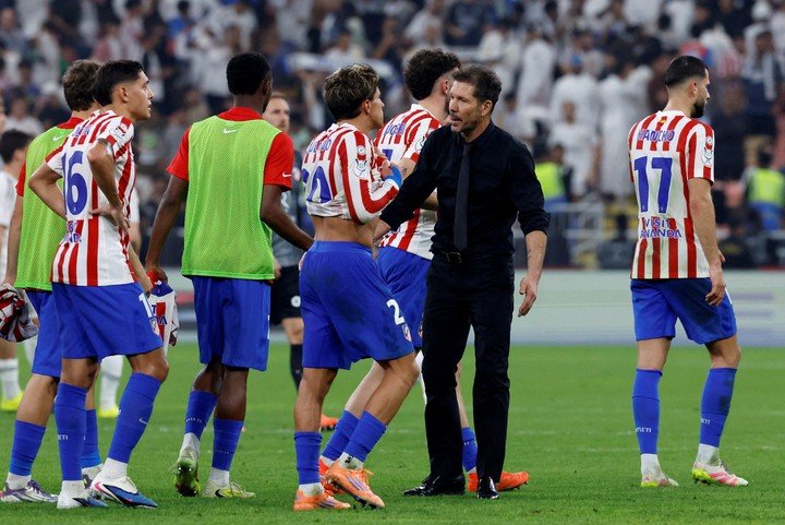 Giuliano y el Cholo. (Foto: Reuters)
