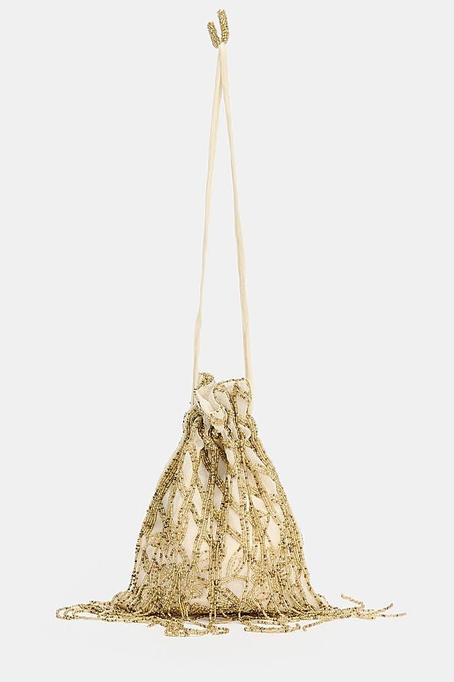 Bolso dorado de Zara (39,99 euros)