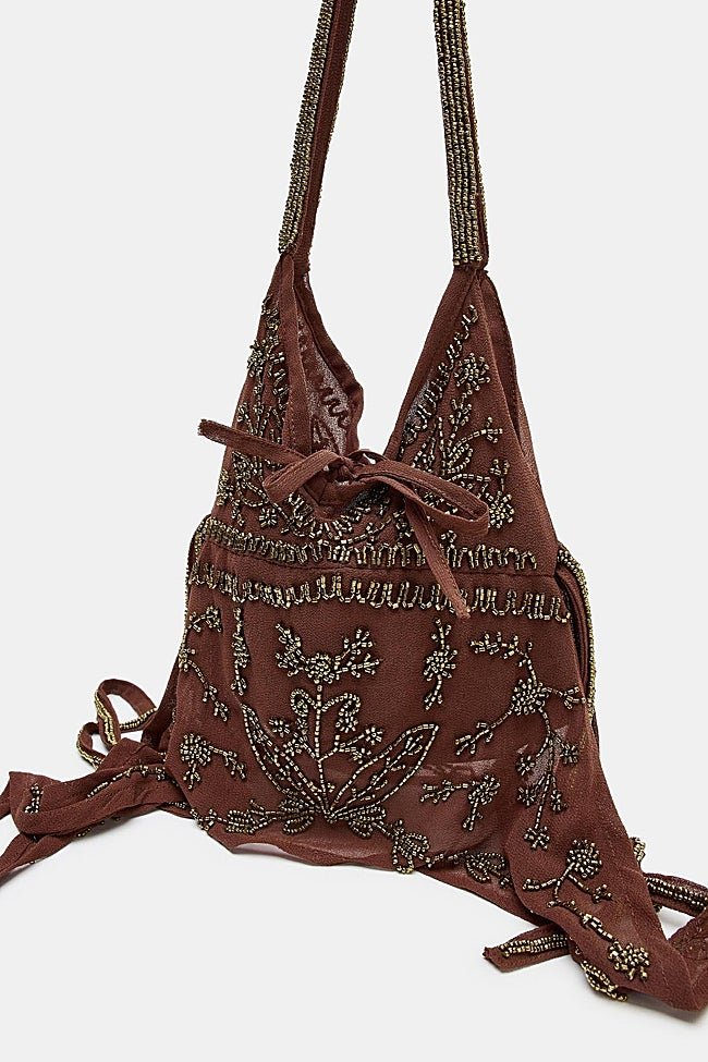 Bolso con pedrería de Zara (39,99 euros)