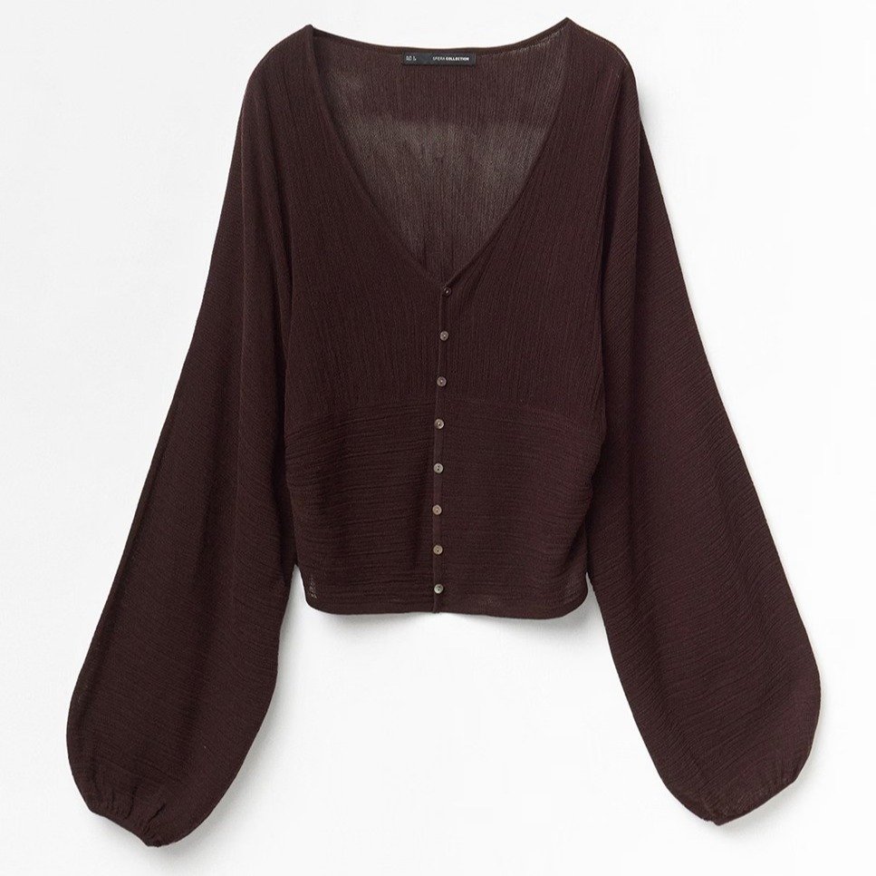 Blusa de mangas abullonadas