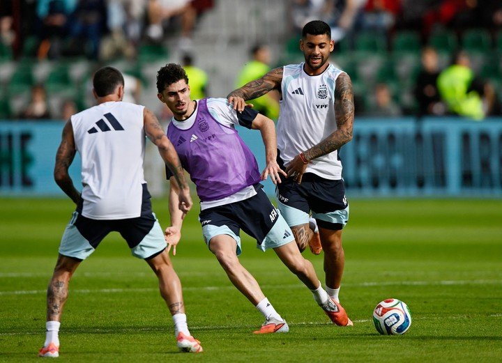 Panichelli y Cuti Romero entrenando (REUTERS/Pablo Morano).