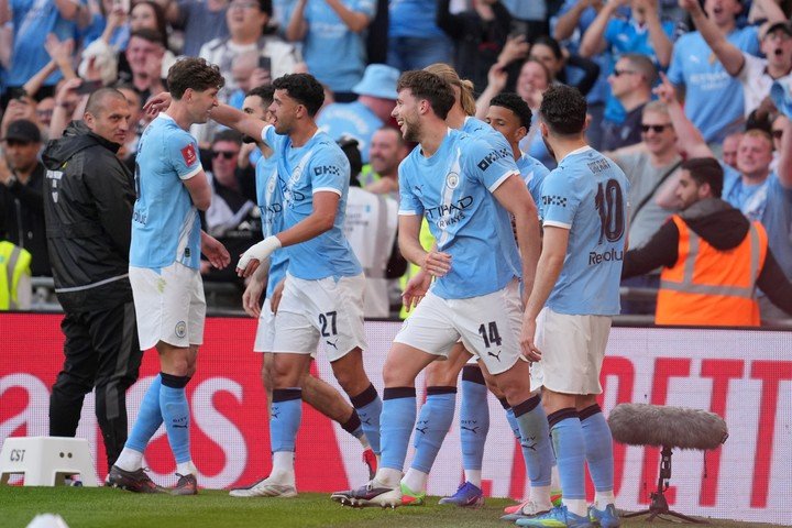 Festejo del Manchester City después de hacerle un gol al Southampton. (AP Photo/Kin Cheung)