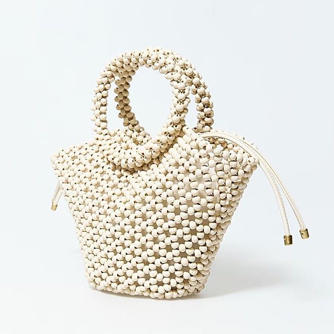 Bolso con abalorios de Sfera(25,99 euros)