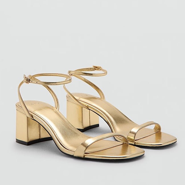 Sandalias doradas de Mango (35,99 euros)