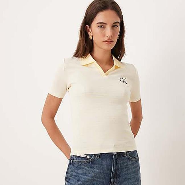 Polo amarillo de rayas de Calvin Klein, 64,90 euros.