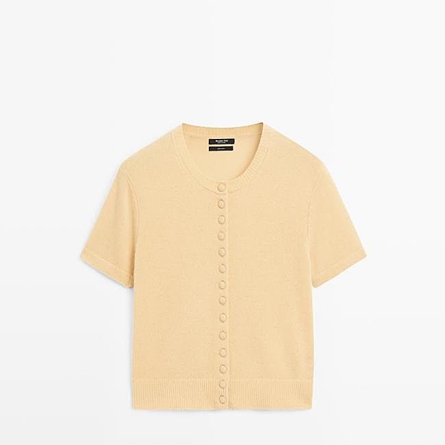 Cárdigan de punto amarillo de manga corta de Massimo Dutti, 59,95 euros.
