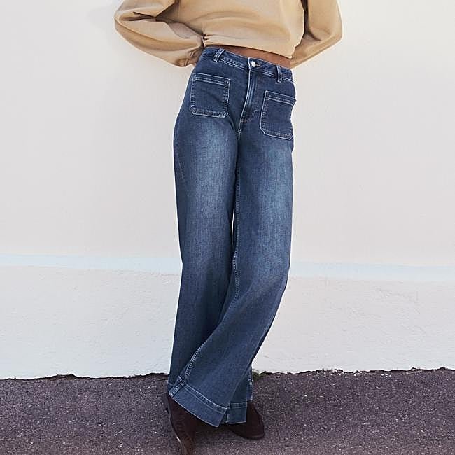 Vaqueros anchos con lavado desgastado de H&M, 27,99 euros.