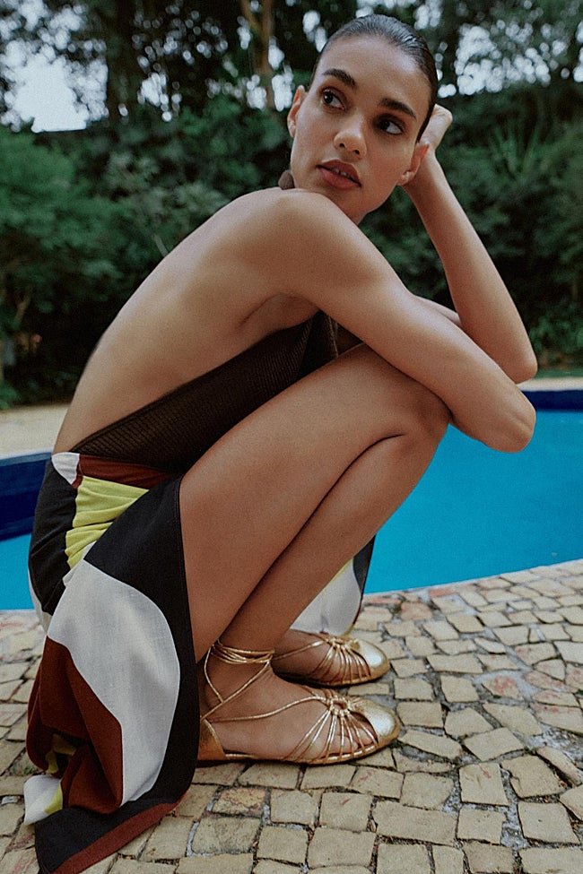 Sandalias doradas de Zara (29,99 euros)