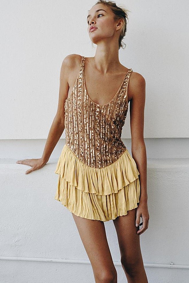 Vestido con lentejuelas de Zara (89,99 euros)