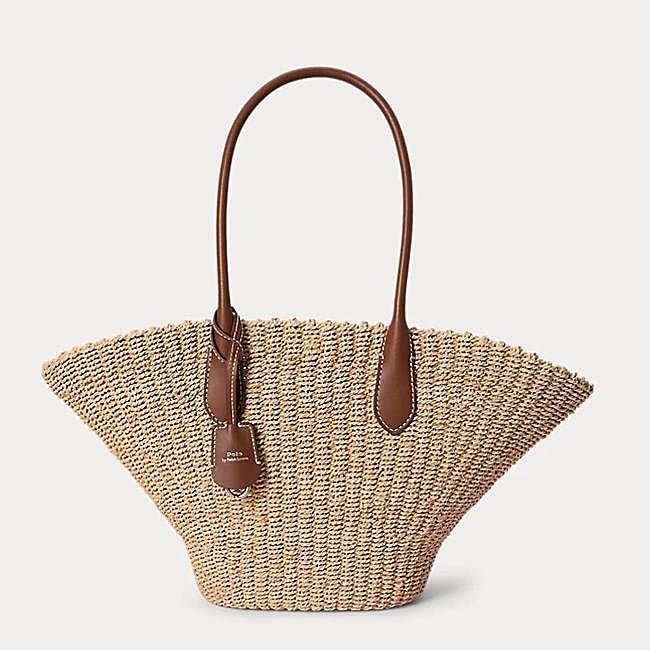 Capazo de rafia con asas de piel de Ralph Lauren, 237 euros.