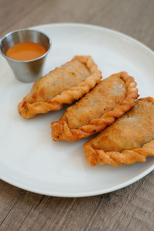 Las empanadillas de pollo de El Buen, mejor de tres en tres.