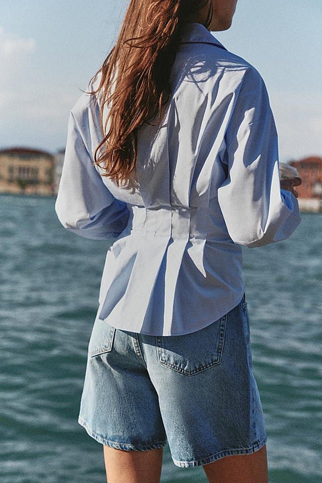 Camisa azul de Zara (25,99 euros)