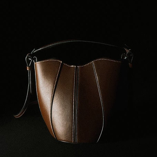 Bolso marrón de Sfera (21,95 euros)
