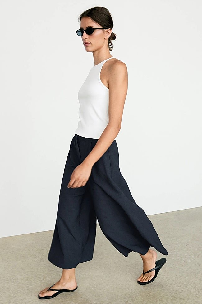 Bermudas azul marino de Massimo Dutti (89,99 euros)