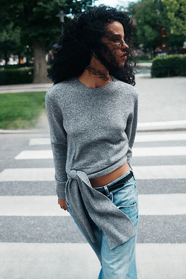 Jersey gris de H&M (22,99 euros)